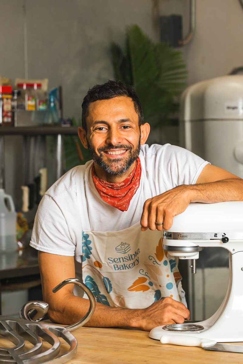 Wassem Moarsi at the mixer in a Sensible Bakery apron